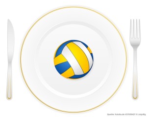 Das Bild zeigt einen Teller mit einer Gabel und und Messer daneben. Sie symbolisieren die Ernährung. Auf dem Teller befindet sich ein Volleyball!